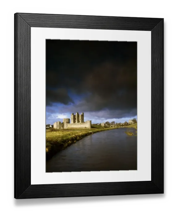 Framed Print : Trim Castle and River Boyne under heavy clouding in County Meath, Ireland