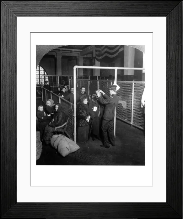 Framed Print : A US Inspector Examining The Eyes Of Arriving Immigrants On Ellis Island, New York Harbor Framed Print : A US Inspector Examining The Eyes Of Arriving Immigrants On Ellis Island, New York Harbor