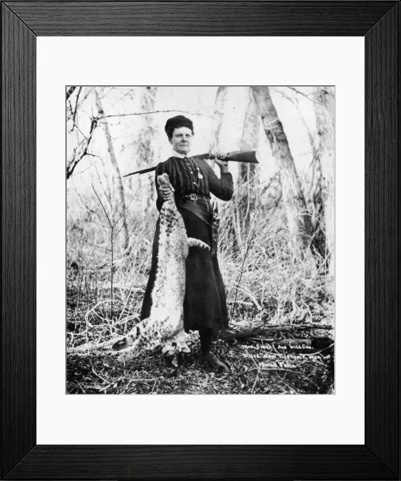 Framed Print : Bobcat. A Photograph of Mrs. Smith holding a Rifle in one hand Framed Print : Bobcat. A Photograph of Mrs. Smith holding a Rifle in one hand