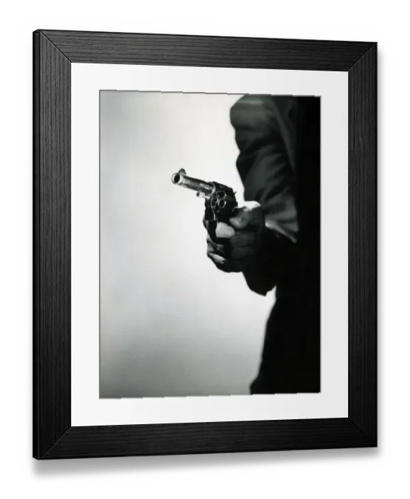 Framed Print : Man holding pistol Framed Print : Man holding pistol