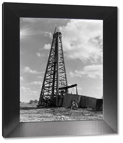 Oil well and derrick