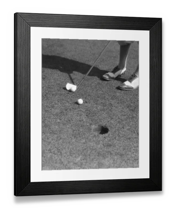 Framed Print : Putting Green With Feet In Golf Shoes In Upper Rig Framed Print : Putting Green With Feet In Golf Shoes In Upper Rig