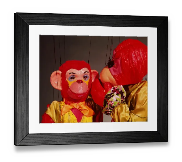 Framed Print : Monkey puppets whispering Framed Print : Monkey puppets whispering