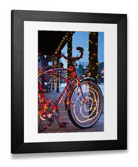 Framed Print : Bicycle covered in colored lights Framed Print : Bicycle covered in colored lights