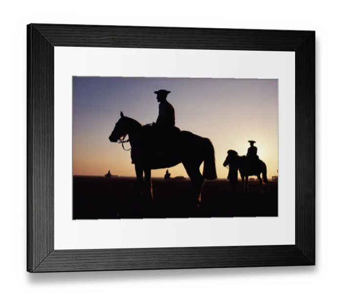 Framed Print : Argentina, horsemen in landscape, silhouette, sunset Framed Print : Argentina, horsemen in landscape, silhouette, sunset