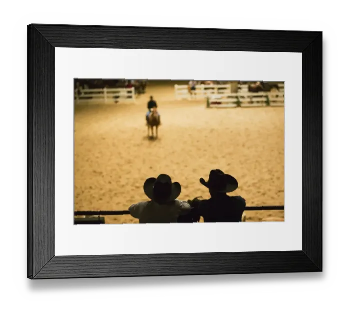 Framed Print : Silhouette of cowboys at indoor rodeo Framed Print : Silhouette of cowboys at indoor rodeo