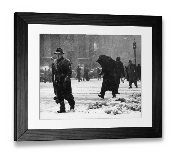 Framed Print : People crossing city street in snow stor Framed Print : People crossing city street in snow stor