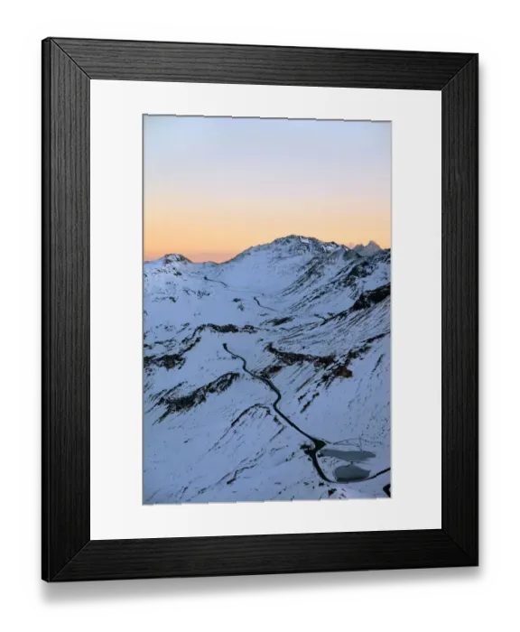 Framed Print : Sun rising over snowy mountaintops Framed Print : Sun rising over snowy mountaintops