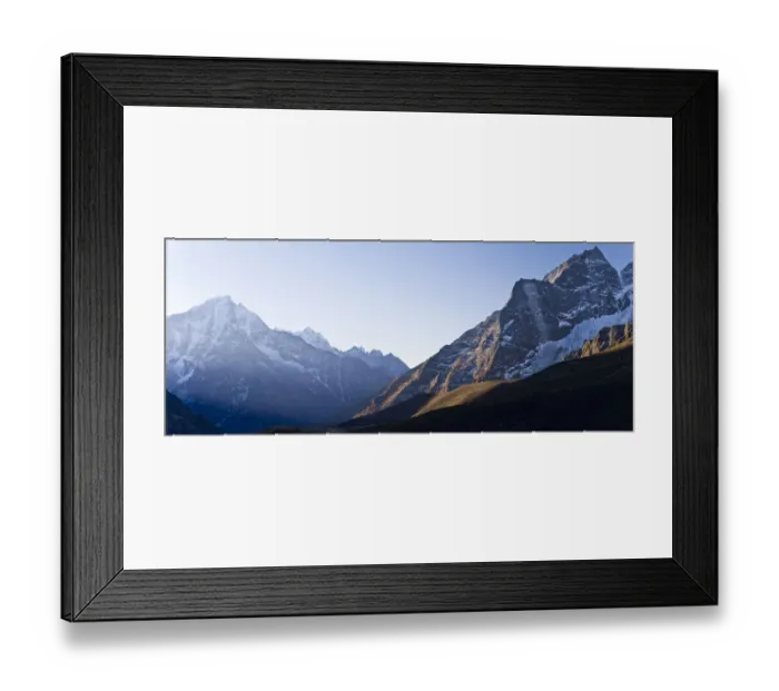 Framed Print : Snowy mountaintops and blue sky Framed Print : Snowy mountaintops and blue sky