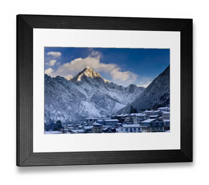 Framed Print : Mountain overlooking snowy village Framed Print : Mountain overlooking snowy village