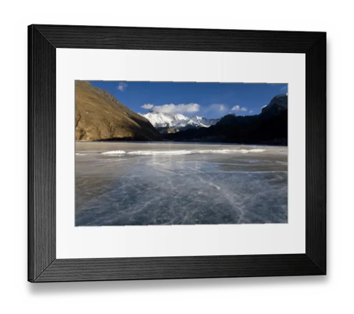 Framed Print : Mountains overlooking frozen valley Framed Print : Mountains overlooking frozen valley