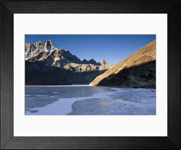 Framed Print : Mountains overlooking frozen valley Framed Print : Mountains overlooking frozen valley