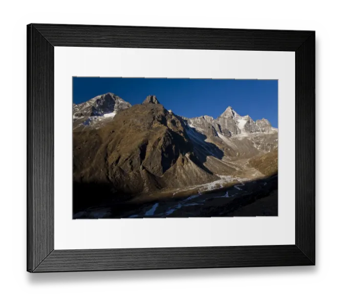 Framed Print : Snowy mountains overlooking valley Framed Print : Snowy mountains overlooking valley