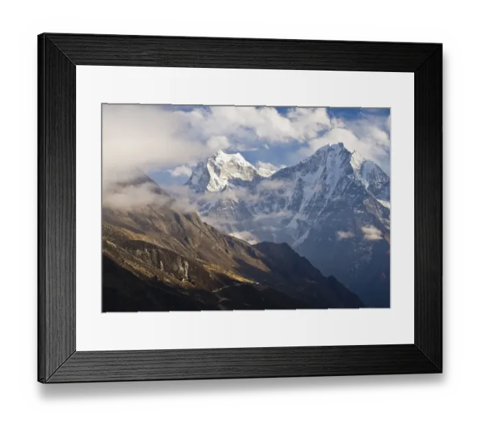 Framed Print : Snowy mountains overlooking valley