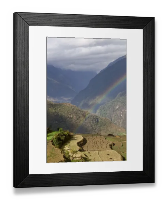 Framed Print : Rainbow over rural mountain valley Framed Print : Rainbow over rural mountain valley