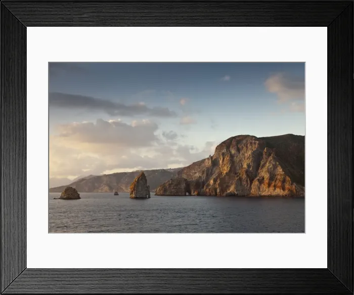 Framed Print : Cliff and rock formations over water Framed Print : Cliff and rock formations over water