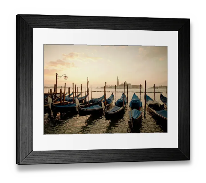 Framed Print : Gondolas docked in harbor