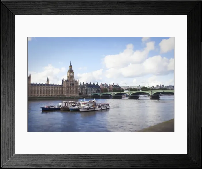 Framed Print : Bridge and buildings on urban river