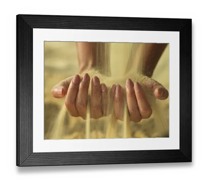 Framed Print : Woman's hands holding sand Framed Print : Woman's hands holding sand
