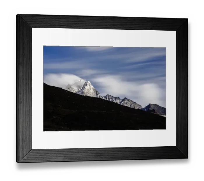 Framed Print : Top of Ama Dablam mountain peak with cloudy movement Framed Print : Top of Ama Dablam mountain peak with cloudy movement