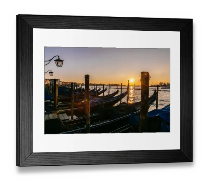 Framed Print : View on gondola station near Piazza San Marco with rising sun on the background