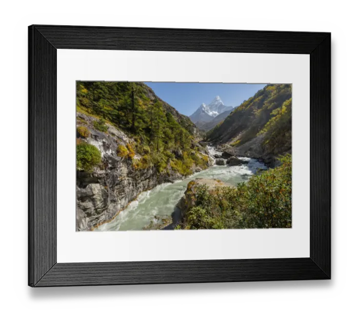 Framed Print : Ama Dablam mountain peak and small river, Everest region