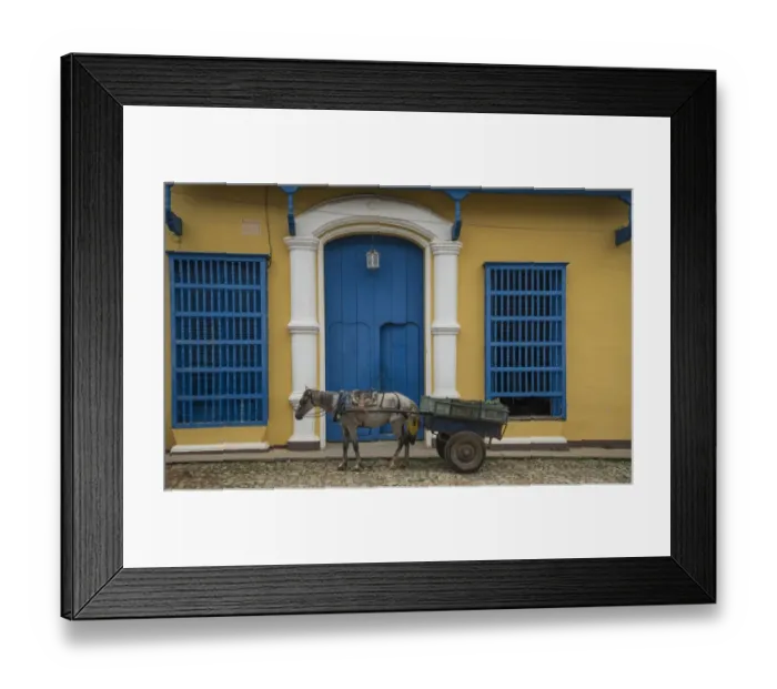 Framed Print : A horse carriage in front of a colonial palace Framed Print : A horse carriage in front of a colonial palace