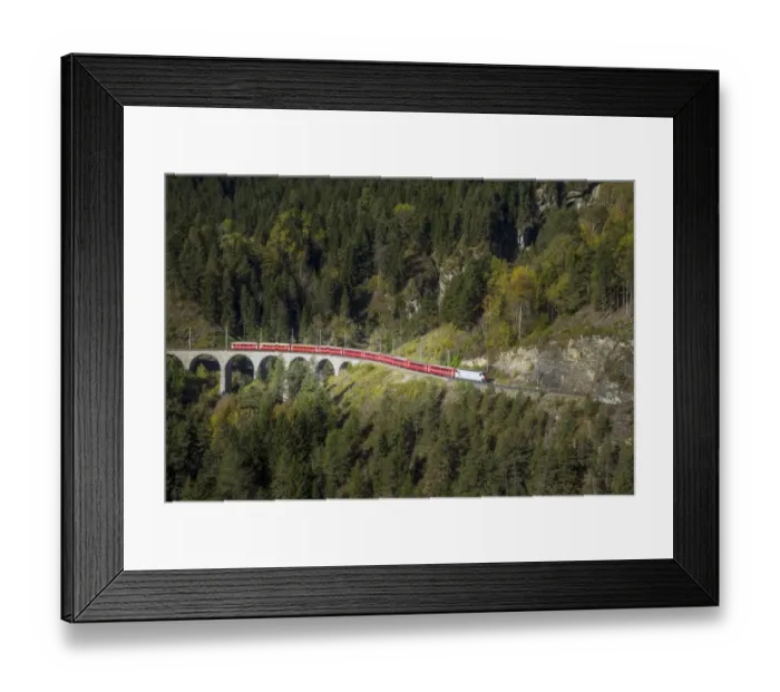 Framed Print : Red train in the mountains