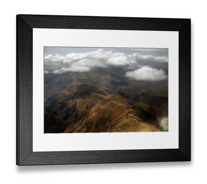 Framed Print : Aerial view of Semien mountains touching clouds