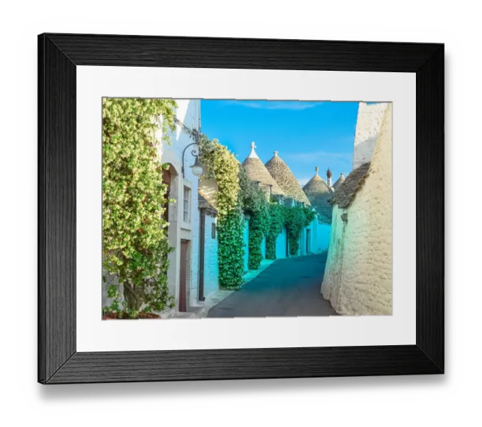 Framed Print : Narrow street with trulli houses in Alberobello Framed Print : Narrow street with trulli houses in Alberobello