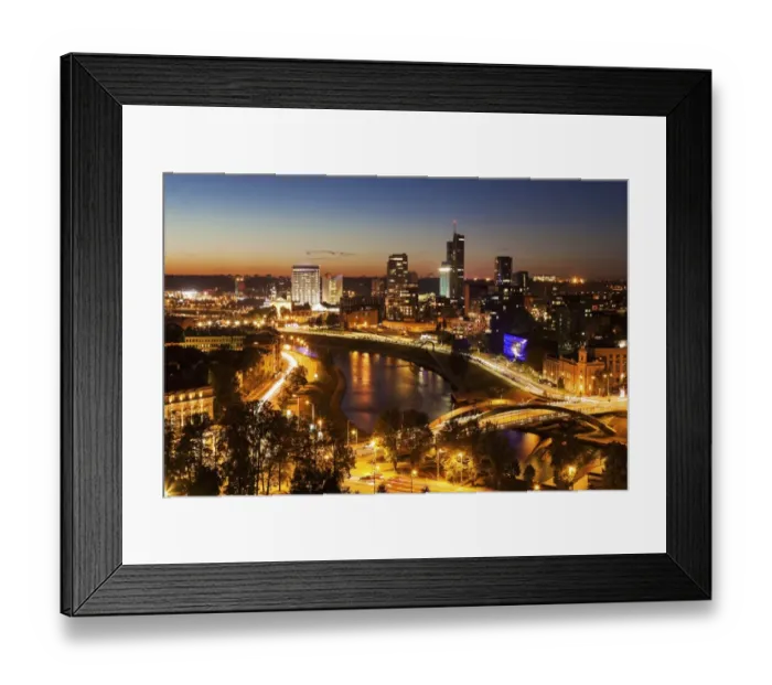 Framed Print : Lithuania, Vilnius, Illuminated riverfront cityscape seen from elevation on opposite bank Framed Print : Lithuania, Vilnius, Illuminated riverfront cityscape seen from elevation on opposite bank
