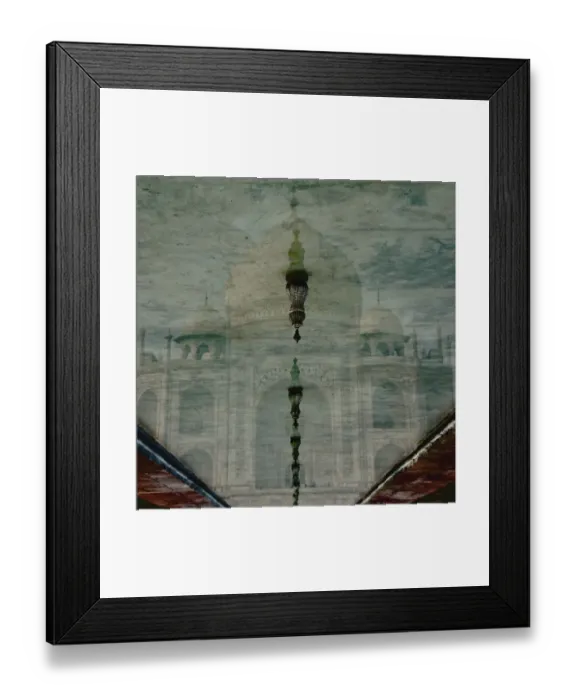 Framed Print : Upside-down reflection of Taj Mahal in a pool of water Framed Print : Upside-down reflection of Taj Mahal in a pool of water
