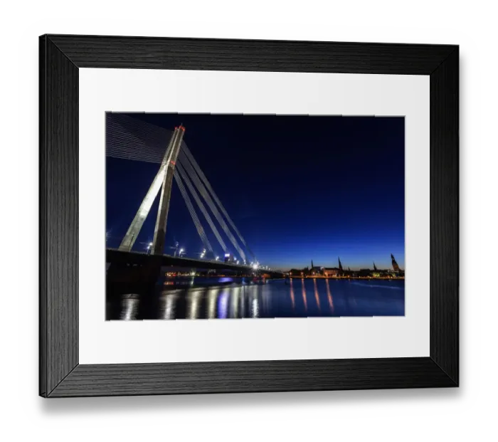 Framed Print : Latvia, Riga, River Daugava, Illuminated Vansu Bridge reflecting in river
