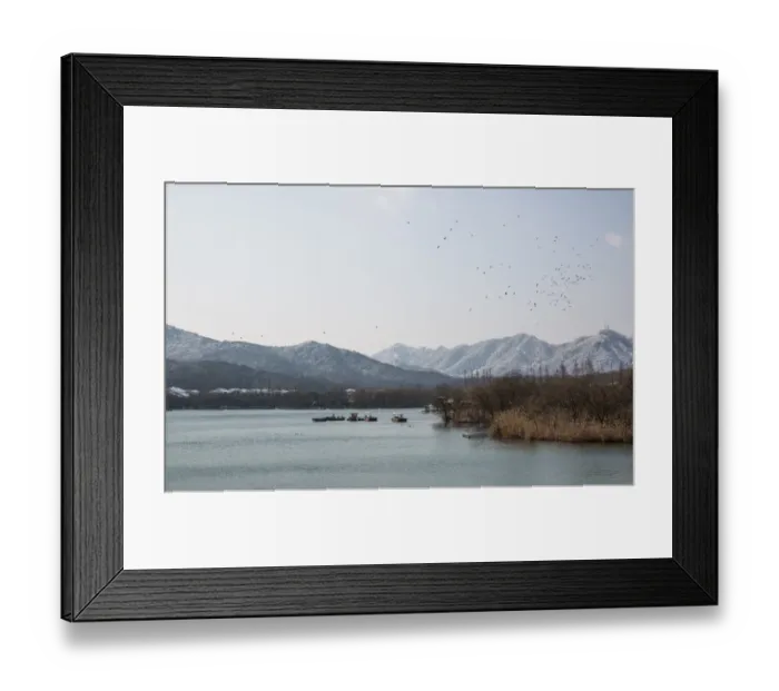Framed Print : Scenic View Of the West Lake surrounded by snow-covered hills, Hangzhou, China Framed Print : Scenic View Of the West Lake surrounded by snow-covered hills, Hangzhou, China