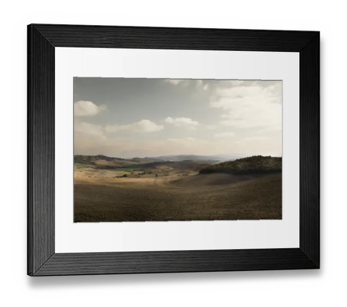 Framed Print : Rolling hills landscape of Val d Orcia after harvesting season Framed Print : Rolling hills landscape of Val d Orcia after harvesting season