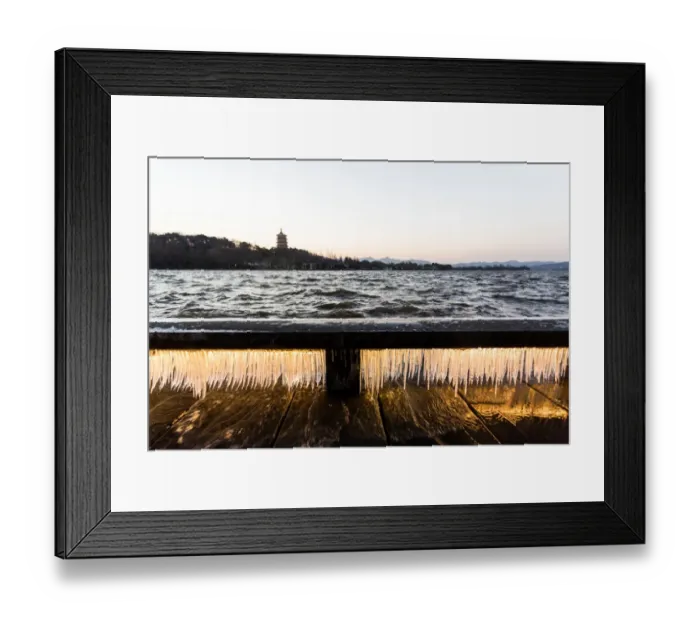 Framed Print : Illuminated icicles on bridge against the Leifeng Pagoda by the West Lake, Hangzhou, Zhejiang, China