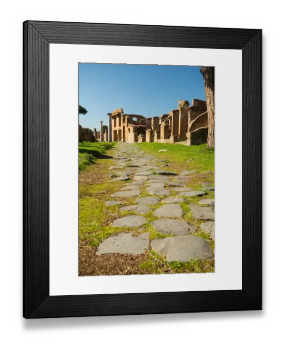 Framed Print : An ancient road in the ruins of the Ancient Roman harbour city of Ostia Antica in Rome, Italy Framed Print : An ancient road in the ruins of the Ancient Roman harbour city of Ostia Antica in Rome, Italy