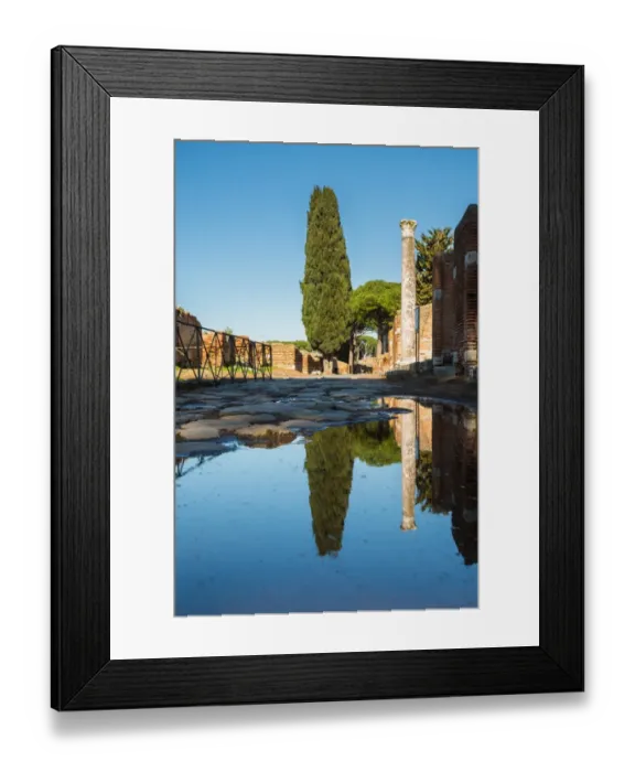 Framed Print : A large puddle in the ruins of the Ancient Roman harbour city of Ostia Antica in Rome, Italy Framed Print : A large puddle in the ruins of the Ancient Roman harbour city of Ostia Antica in Rome, Italy