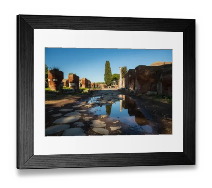 Framed Print : A large puddle in the ruins of the Ancient Roman harbour city of Ostia Antica in Rome, Italy Framed Print : A large puddle in the ruins of the Ancient Roman harbour city of Ostia Antica in Rome, Italy