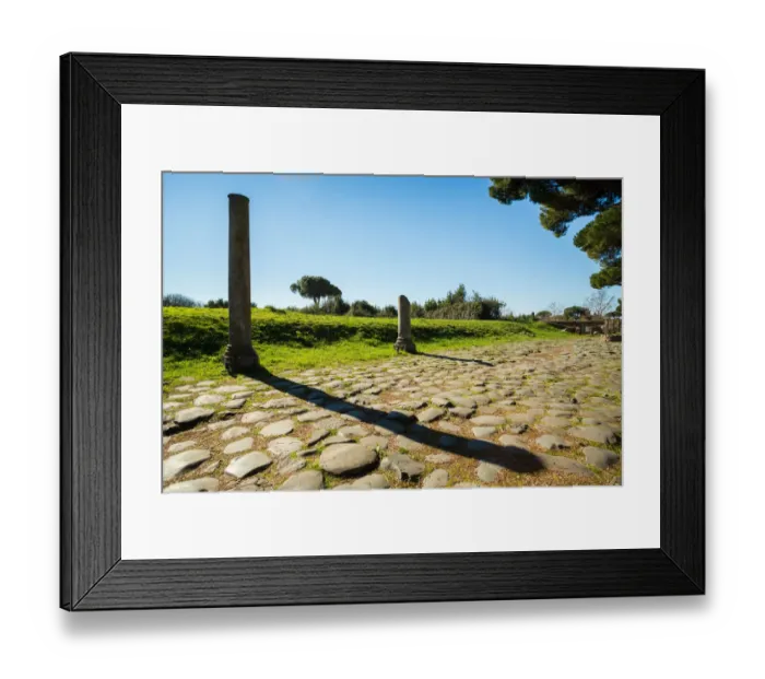 Framed Print : An ancient Roman road in the ruins of the Ancient Roman harbour city of Ostia Antica in Rome, Italy Framed Print : An ancient Roman road in the ruins of the Ancient Roman harbour city of Ostia Antica in Rome, Italy