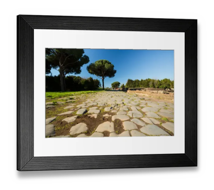 Framed Print : An ancient Roman road in the ruins of the Ancient Roman harbour city of Ostia Antica in Rome, Italy Framed Print : An ancient Roman road in the ruins of the Ancient Roman harbour city of Ostia Antica in Rome, Italy