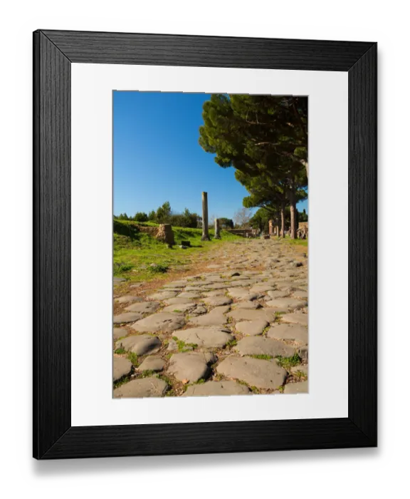 Framed Print : An ancient Roman road in the ruins of the Ancient Roman harbour city of Ostia Antica in Rome, Italy Framed Print : An ancient Roman road in the ruins of the Ancient Roman harbour city of Ostia Antica in Rome, Italy