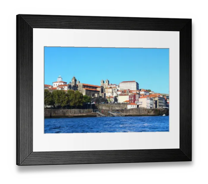 Framed Print : View of Ribeira district from Douro river with the Church of San Francisco and Portos Cathedral in the background Framed Print : View of Ribeira district from Douro river with the Church of San Francisco and Portos Cathedral in the background