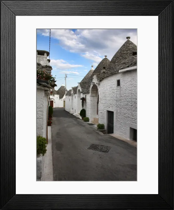 Framed Print : Streets lined by Trulli houses in Alberobello, near Bari, Apulia, southern Italy Framed Print : Streets lined by Trulli houses in Alberobello, near Bari, Apulia, southern Italy