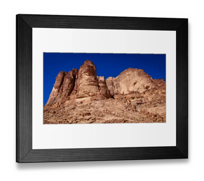 Framed Print : Lawrence Springs peak in Wadi Rum on clear blue sky winter day Framed Print : Lawrence Springs peak in Wadi Rum on clear blue sky winter day