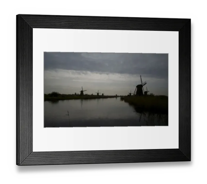 Framed Print : Kinderdijk view against the clouds