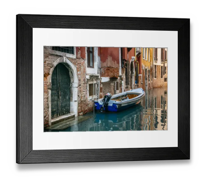 Framed Print : Boat moored by the townhouse door facing canal in Venice, Italy