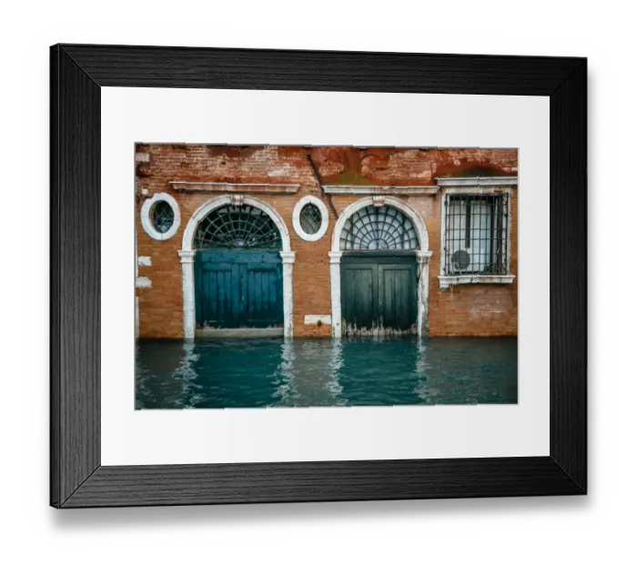 Framed Print : Half sunken doors of townouse by the canal in Venice, Italy Framed Print : Half sunken doors of townouse by the canal in Venice, Italy