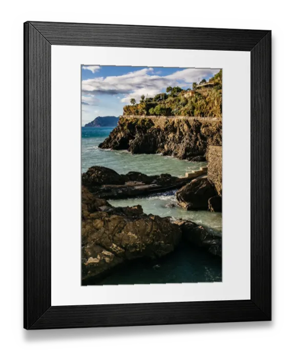 Framed Print : Ligurian sea coastline as seen from Manarola village in Cinque Terre National Park, Liguria, Italy Framed Print : Ligurian sea coastline as seen from Manarola village in Cinque Terre National Park, Liguria, Italy