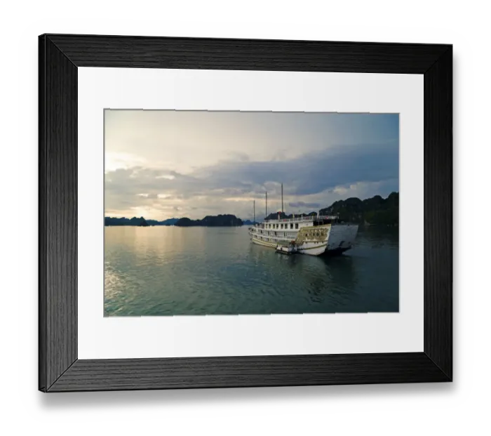 Framed Print : Junk cruise ship going to anchor for the night, Halong Bay, Vietnam Framed Print : Junk cruise ship going to anchor for the night, Halong Bay, Vietnam